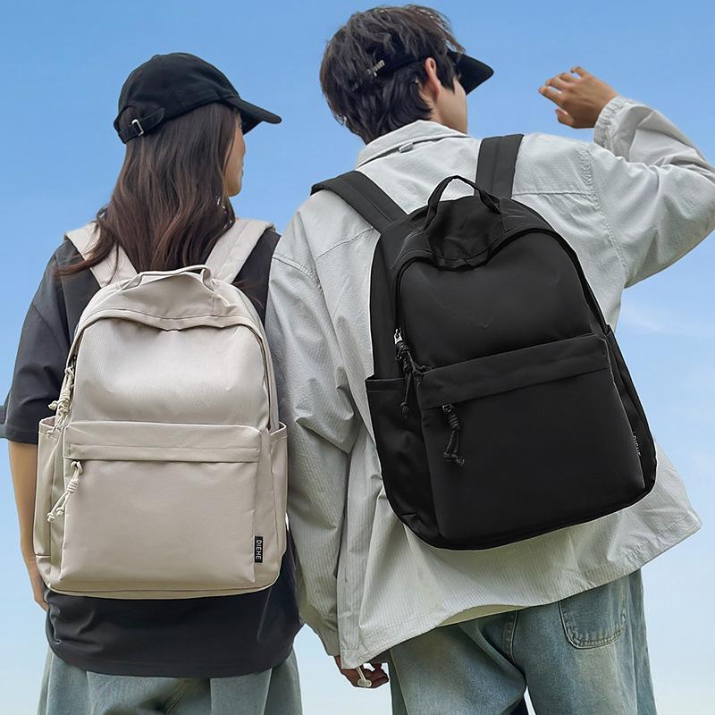 New trendy and cool men's casual backpack, junior high school student class schoolbag, women's large-capacity simple backpack