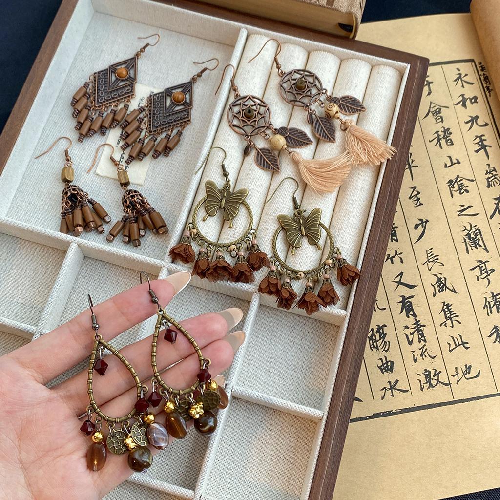 Kolczyki z zawieszką w kształcie muszli w stylu retro etnicznym, modne, z osobowością, niszowe, temperamentne, kolczyki o wykwintnym designie