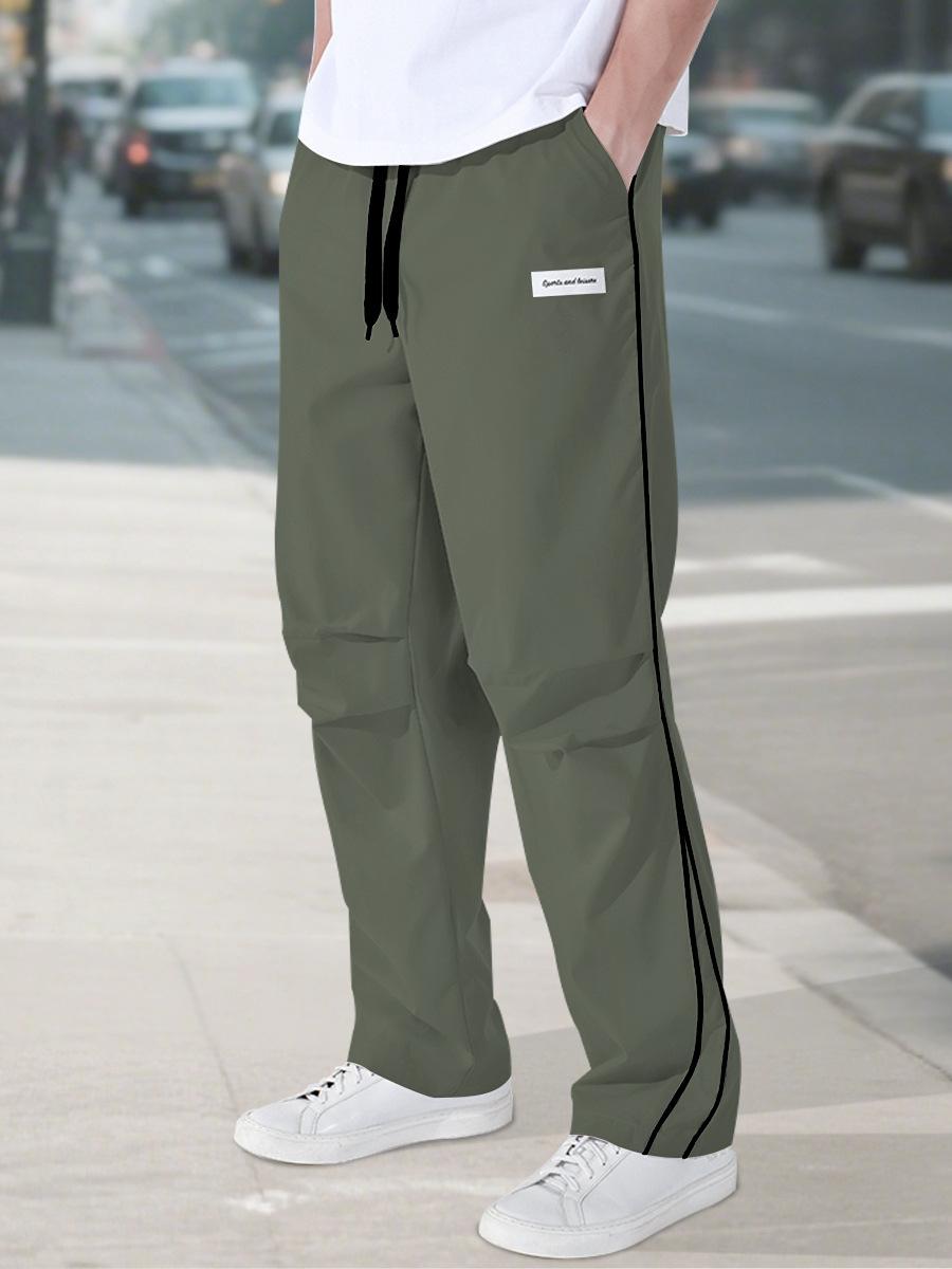 

Летние мужские черные спортивные штаны с полосками - Повседневная спортивная одежда Дышащие Удобные Идеальны для спортзала, уличной одежды и повседневной носки XXXL зелёный