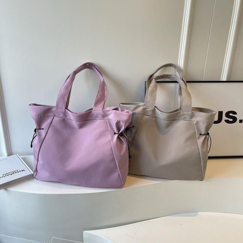 Large-capacity tote canvas bag, high-value commuting to work and going out, literary and artistic student clothing book, shoulder cloth bag bag.