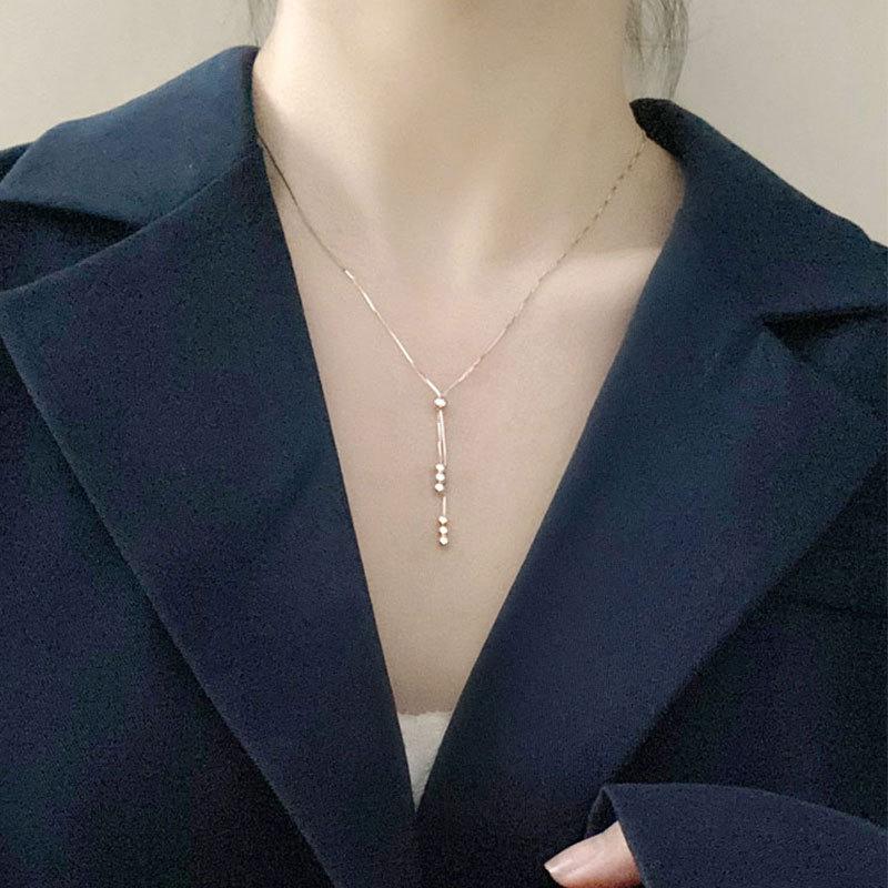 Einfache Damen Halskette mit Nischenperlen und Quasten für Damen-Schlüsselbeinketten, lässiger Stil, Geschenk