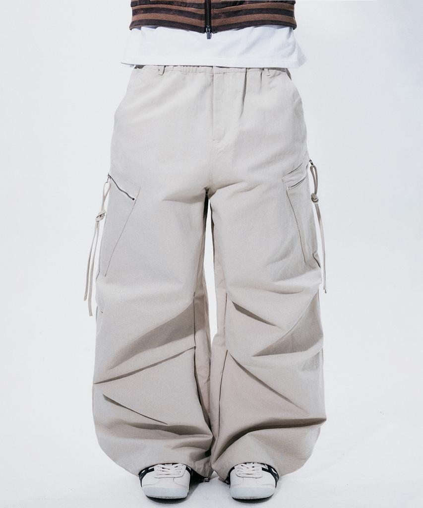 SOMEPLACE MAN Plain Diagonal Zipper Pocket Strap Parachute Wide Pants_2 Colors