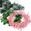 Cheerful Christmas Decorative Garland With Colorful Snowflake Candy Cane And Lush Leaves Green
