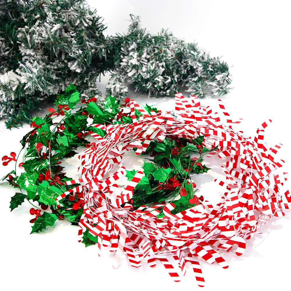 Cheerful Christmas Decorative Garland With Colorful Snowflake Candy Cane And Lush Leaves Green