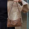Hot autumn and winter new leopard print cowhide saddle bag women's genuine leather shoulder messenger bag commuter handbag women