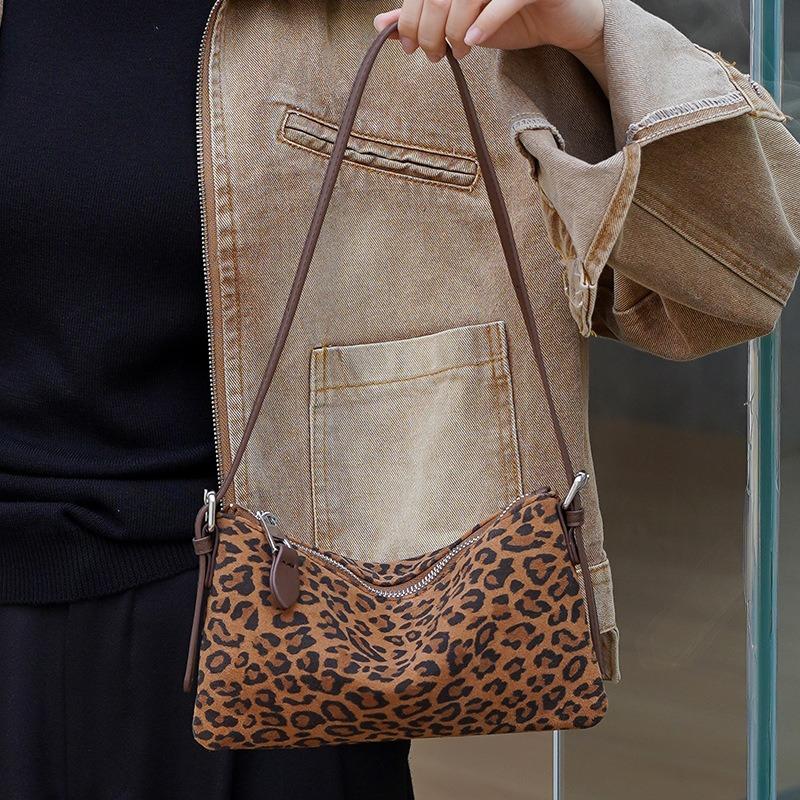 Hot autumn and winter new leopard print cowhide saddle bag women's genuine leather shoulder messenger bag commuter handbag women