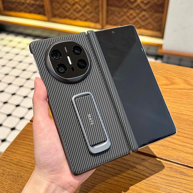 Applicable to Huawei matex6 mobile phone case carbon fiber pattern x5 collection wristband bracket x3 central axis anti-drop folding leather case