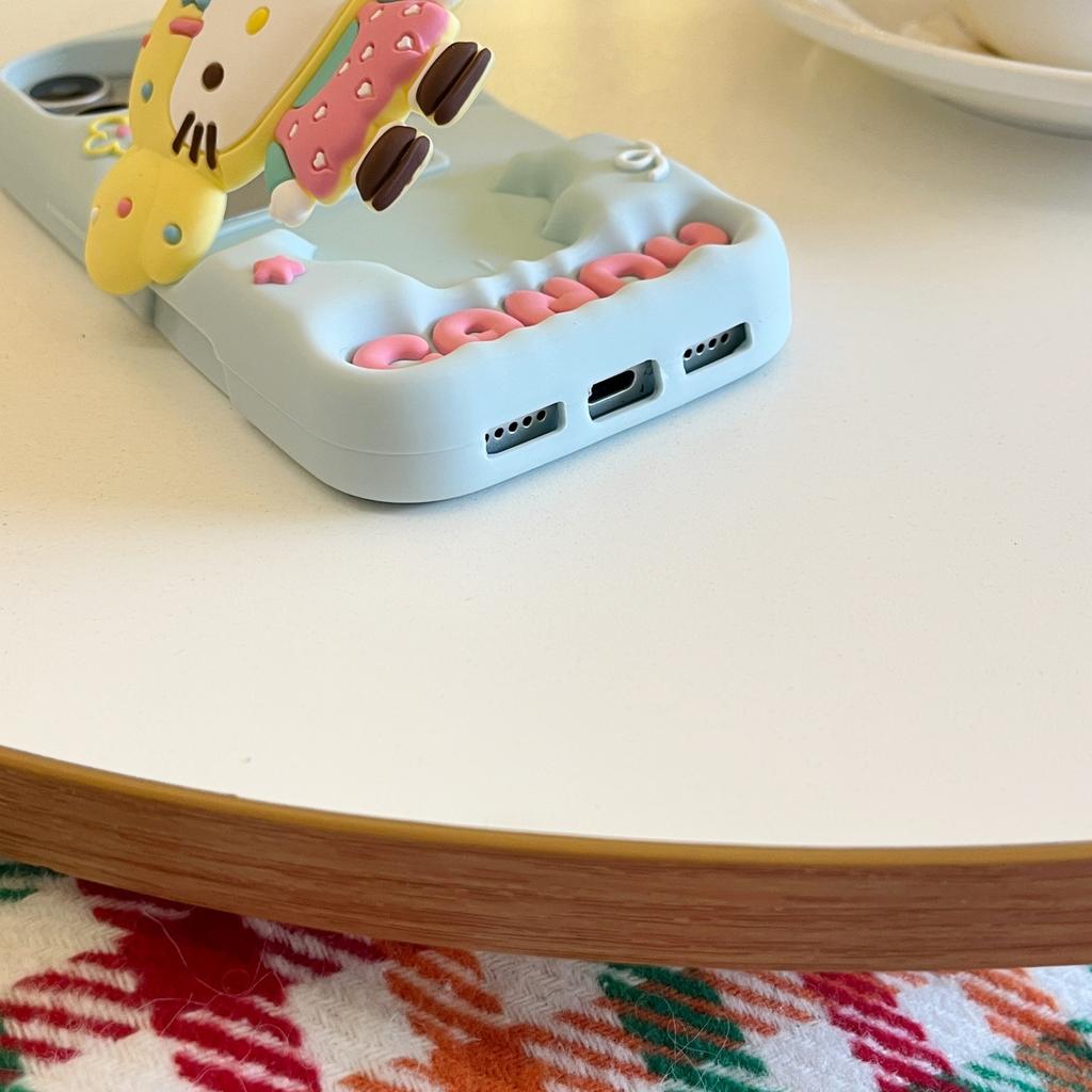 Blonde KT Cat Holder for iPhone16 Apple 15promax Mobile Phone Case 14/13 Female 17pro Protective Case