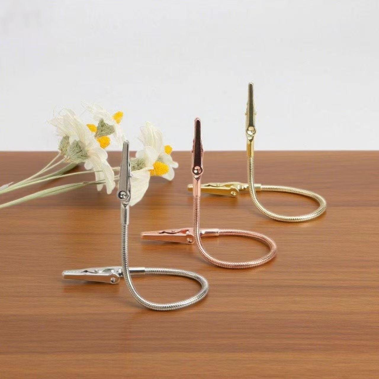 

Двусторонний зажим-держатель для спиралей от комаров из нержавеющей стали 13CM hose double-head clip серебряный