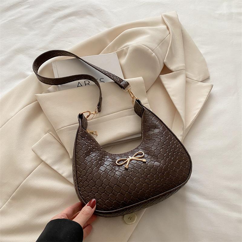 

Sweet girl heart 2025 woven pattern new simple fashion foreign style bow underarm shoulder bag high value