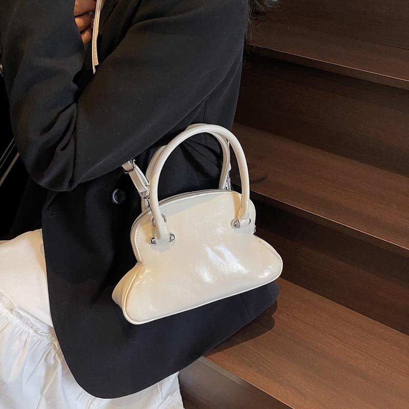 Premium sense niche bag women's spring summer 2025 new fashion simple messenger bag women's portable bowling bag