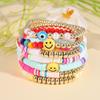 Korean version of fashion new multi-layer elastic thread soft pottery love smiley face bracelet set retro handmade pearl jewelry women