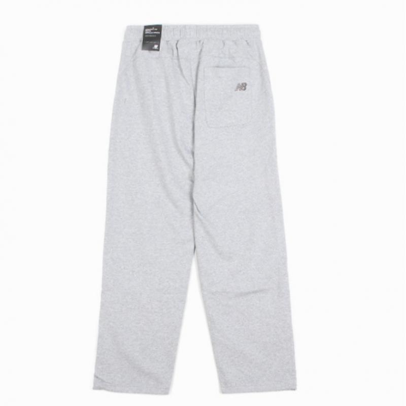New Balance Pantaloni largi Uni Sports Club Nbmlfco123 Antrenament AC
