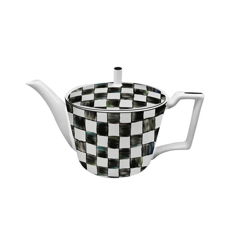 Piatto piano in ceramica a scacchi bianco e nero Tazza da caffè e piattino in bone china Piatti per cibi occidentali Stoviglie eleganti per la casa Tazza