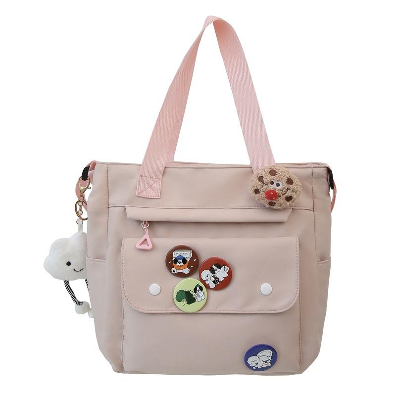 

Студентська сумка великої ємності Сумка на плече Жіноча сумка для приміських поїздок Сумка через плече рожевий