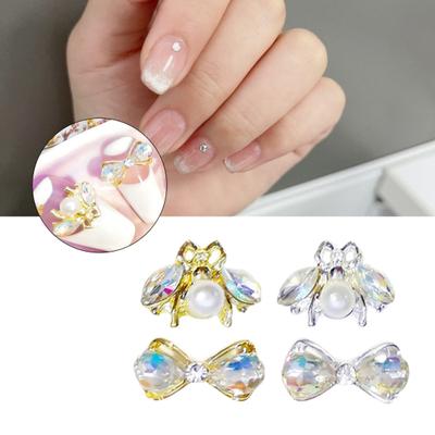 Paquete de 10 adornos para manicura, fáciles de aplicar, de aleación, con lazo y diamantes de imitación para uso personal.