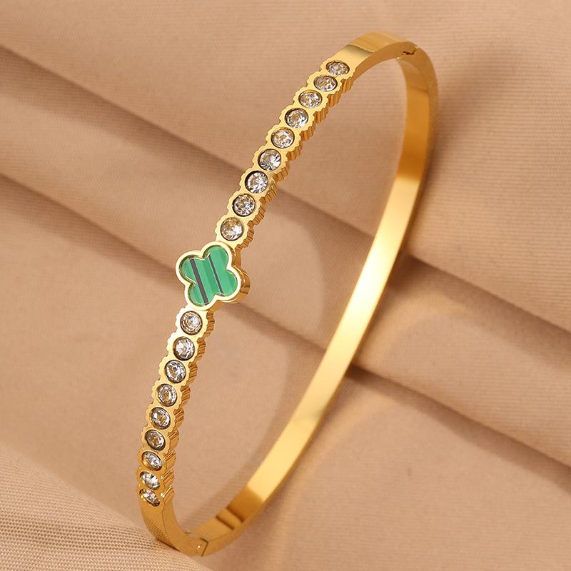 Titanium steel  women's light luxury high-end sense four-leaf flower with diamonds does not fade lucky grass open  