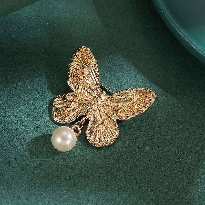 French butterfly brooch high-end sense light luxury personality niche high-end women's retro pin suit accessories