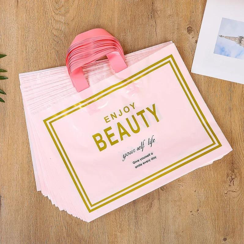 50pcs New models Handbag thick 0.14mm durable clothing cosmetic gift Shopping bags Resilient Powerful handheld Portable Packaging bag