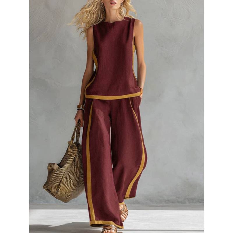 Tuta da donna estiva senza maniche a blocchi di colore con tasche e inserti per abbigliamento casual