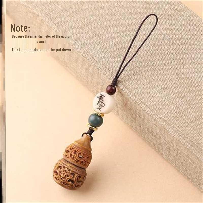 Green Sandalwood Sachet Ball: Ancient-Style Aromatherapy Pendant & Mobile Phone Lanyard with Opening Feature.