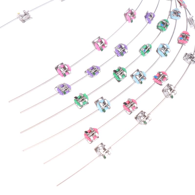 2 Stück Mode Split-Typ Mini Bunte Brackets Fake Zahnspangen Ohne Haken Temporäre Zahndekoration Metallbracket Zahnwerkzeug