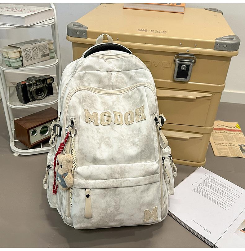 Schoolbag manufacturers wholesale backpack large capacity air cushion outdoor travel bag computer bag lightweight junior high school high school