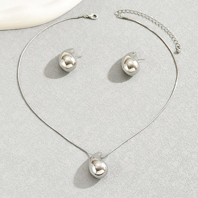 

Комплект ювелирных изделий в форме капли воды, 2 предмета, ожерелье, серьги-гвоздики, цвет: золото, серебро, сплав цинка, простой стиль для женщин серебряный