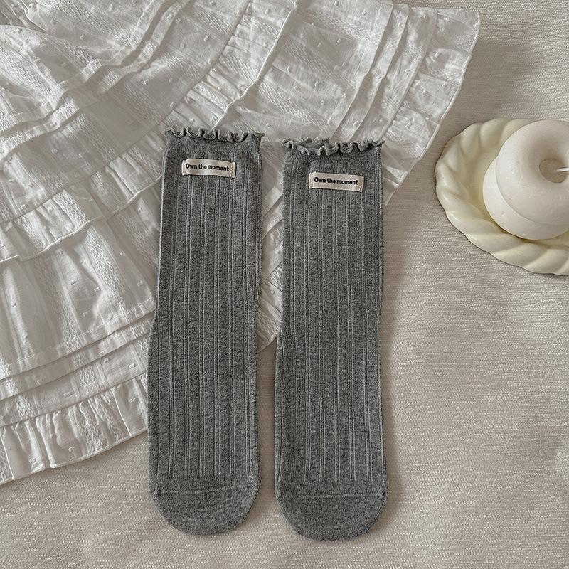 Female Spring and Autumn Pure Color Draw A Letter Cloth Label Ear Side In The Tube Pile Socks
