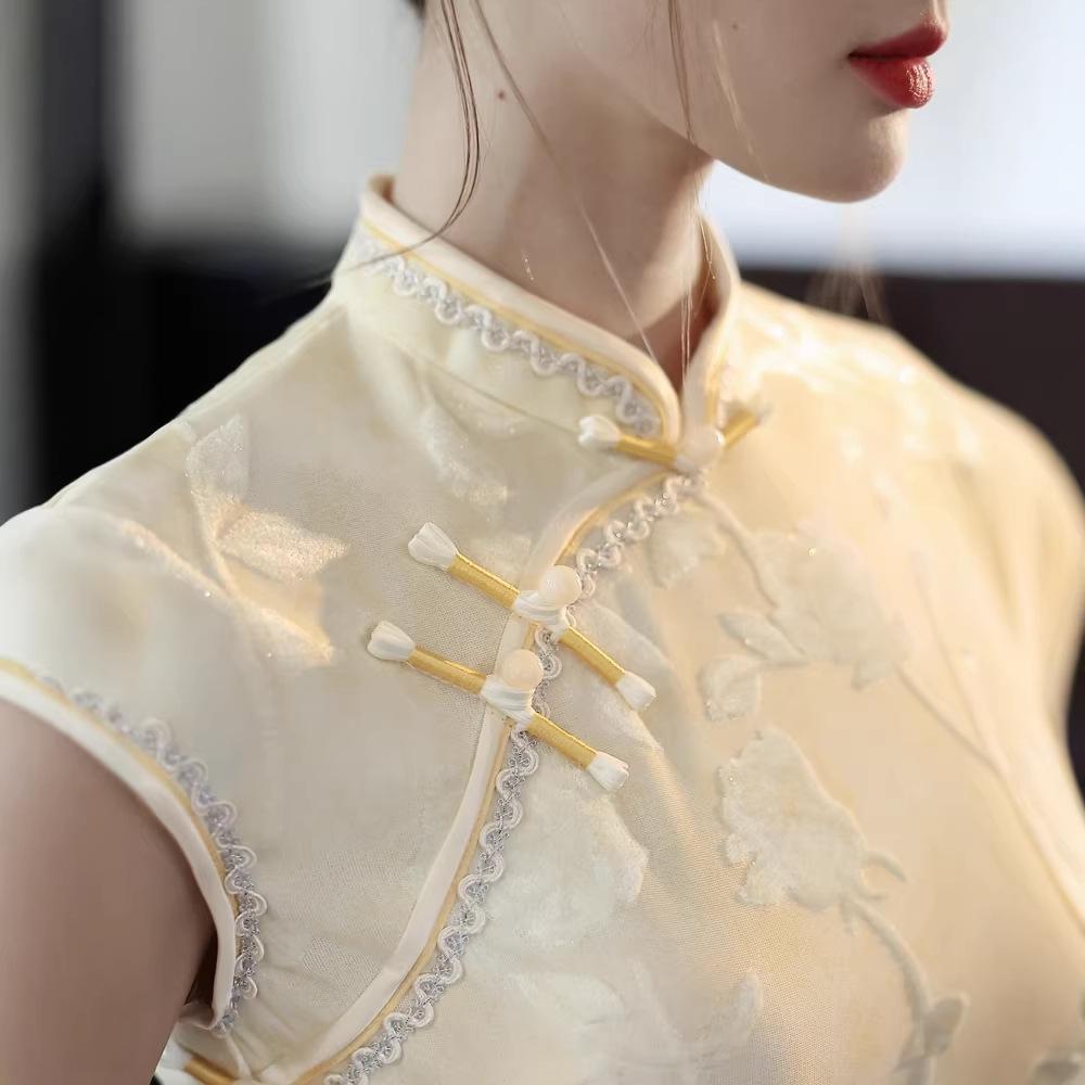 Bei Zhiyun yellow knitted jacquard long literary cheongsam women's 1011 spring new girls short sleeves young work wear
