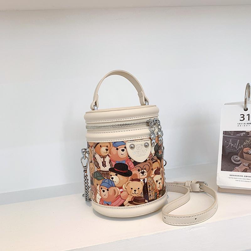 

Сумка-ведро для девочки, симпатичная сумка-кошелек с маленьким медвежонком, женская, новинка 2023 года, модная сумка через плечо Niche Cylinder, переносная сумка на одно плечо бежевый