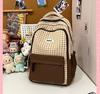 Schoolbag Korean version of the new high-value fresh college style contrasting color plaid backpack junior high school students lightweight
