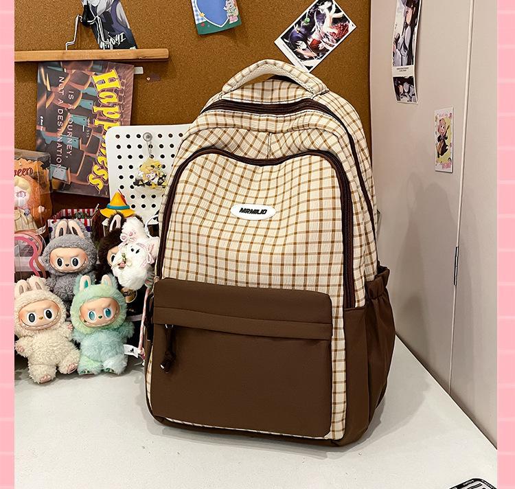 Schoolbag Korean version of the new high-value fresh college style contrasting color plaid backpack junior high school students lightweight