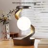 Induction Table Lamp: Rotating Seven-Color Atmosphere Light with Wireless Phone Charging