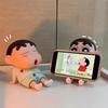 Kawaii Crayon Shin-Chan Figures Phone Holder Anime Desktop Ornaments Cartoon Watching TV Phone Support Cute Doll Decorations