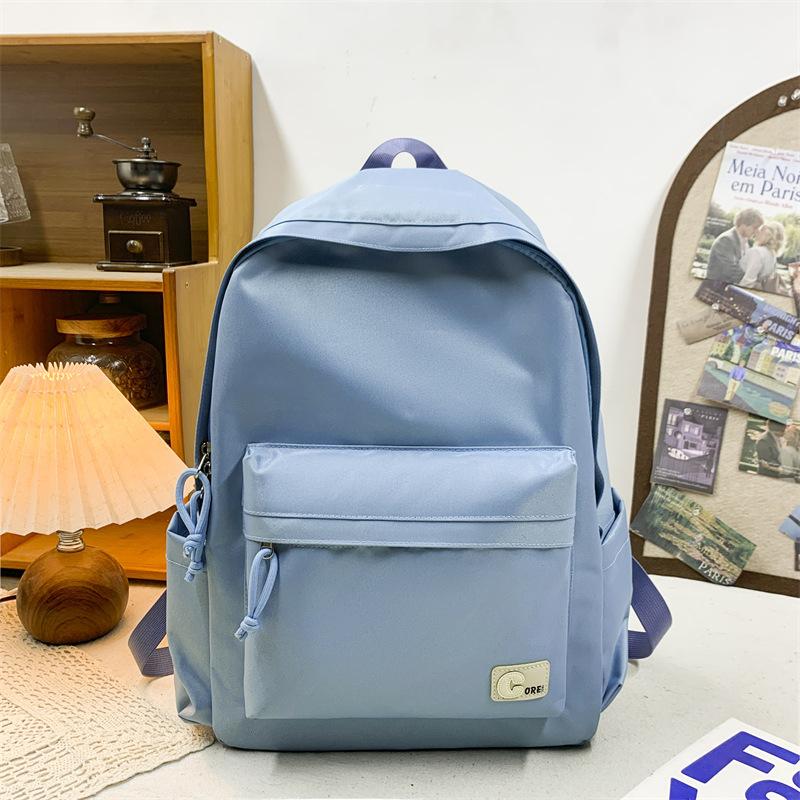 Schoolbag new ins wind Japanese soft sister schoolbag female Korean version solid color middle school student backpack light travel backpack