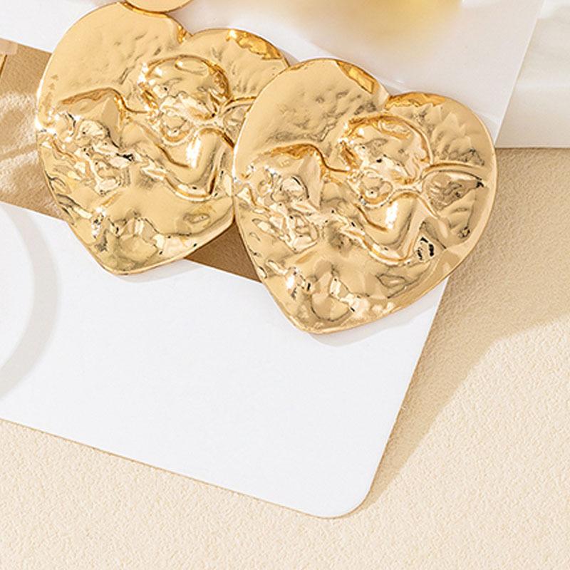 A set of four pairs of golden yellow glossy earrings, flower love, geometric style, simple, elegant and fashionable