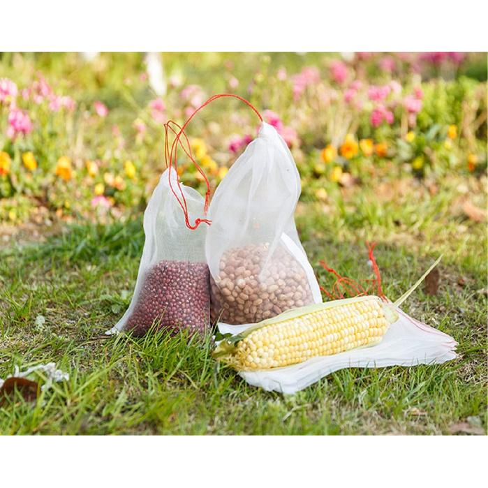 

Large Size Fruit Protection Mesh Bags,20Pack Garden Plant/Fruit/Flower Protect Protect Drawstring Net Barrier Bag (21.5 x14 )
