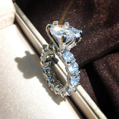 Europäischer und Amerikanischer Modeschmuck Handplattiertes Platin Zirkon Sechs-Krappen-Ring Luxus Leuchtender Stern Verlobungsring