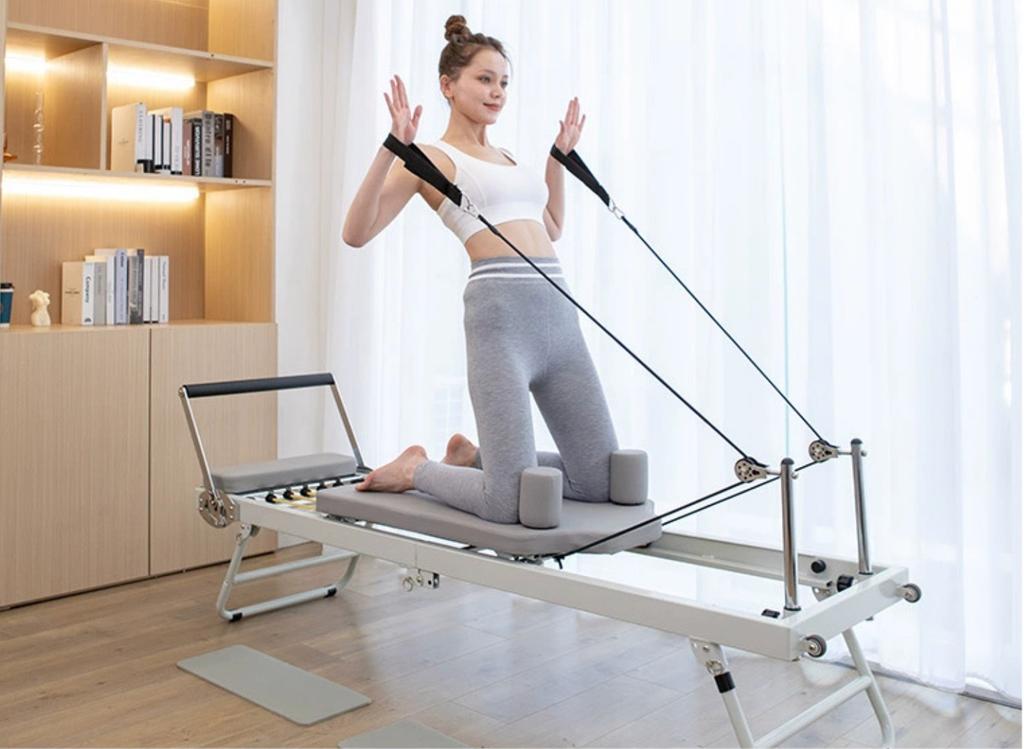 Pilates Reformer Yoga Exercise Machine Metal Frame Folding Reformer Pilates Core Bed for Yoga Exercise