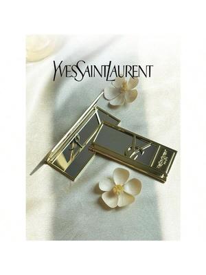 Miroir de maquillage portable YSL doré, un outil parfait pour les retouches, facile à transporter, d'excellente qualité et une excellente idée cadeau.
