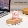 Mobile Phone Stand - Zhenan Zhenan, a Cute Resin Figurine for Home, Living Room, Tabletop Decoration. A Cute Pig-shaped Toy for Luxury Display.