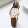 Nuova versione coreana dell'orologio di tendenza semplice personalità retrò originale da studente con cinturino in pelle al quarzo per uomo e donna