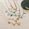 Collar de Perlas de Dopamina en Forma de Corazón con Colgante de Estrella de Mar Multicolor en Acero Inoxidable.