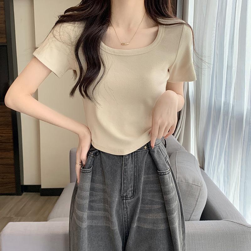 Jednobarevné základní všestranné dámské tričko s kulatým výstřihem, designovým zakřiveným lemem, krátkým slim fit střihem, letní novinka pro spodní vrstvu
