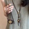 New Chinese leather pendant, fringed necklace, female ethnic style, niche retro sweater chain, fashion and high-end item jewelry.