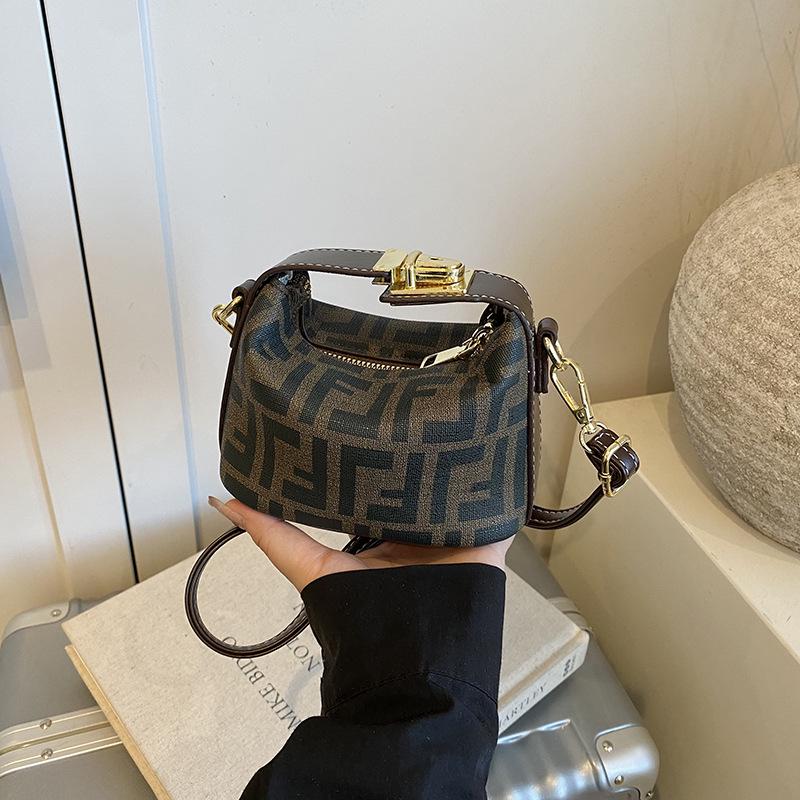 

Korean Mini Denim Dumpling Bag: Light Luxury Versatile Handbag for Kids