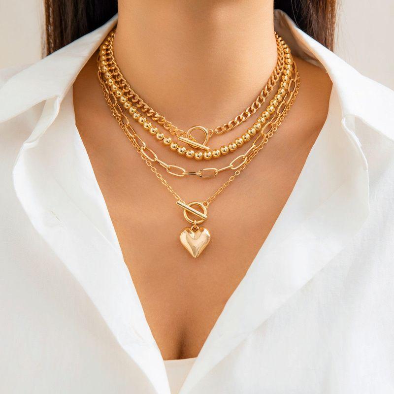 

Love. V European Hip Hop Multi-Layer Twin Sweater Chain Women s Geometric All-Match OT Buckle Short Heart Necklace Gold - Set of 4