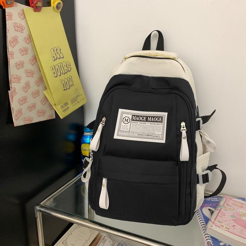 The schoolbag is high-value, fresh and cute, the schoolbag is casual, simple and light, and the commute is versatile and large capacity.