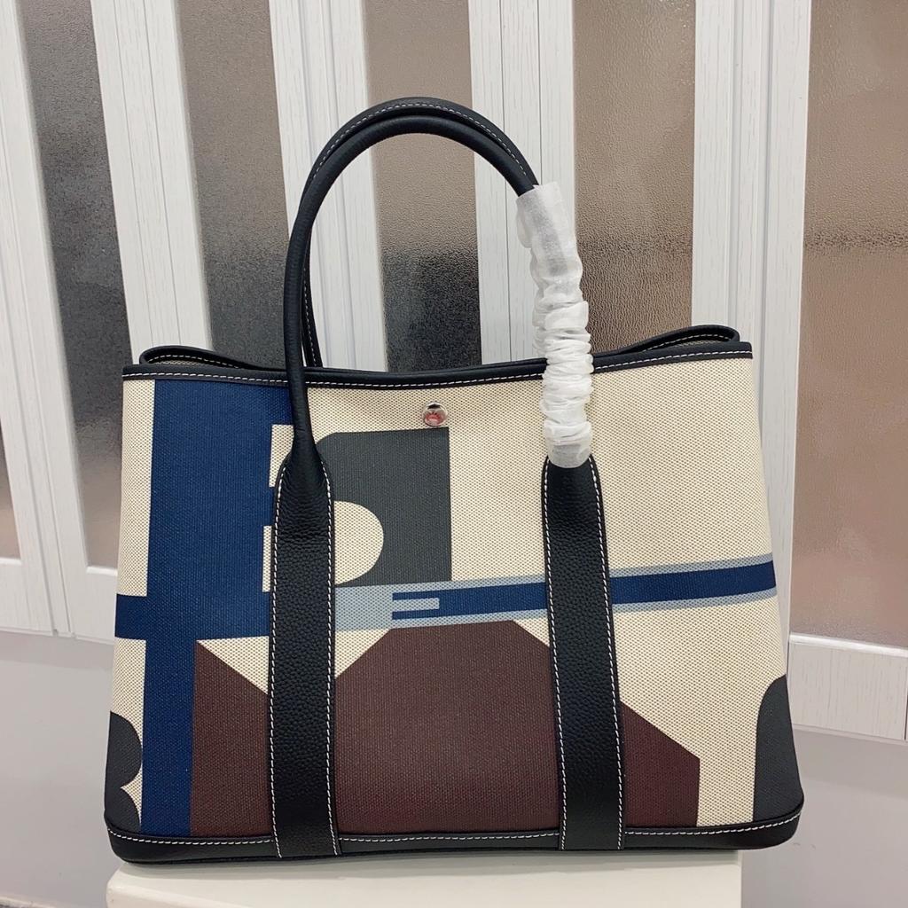 2025 Canvas With Top Layer Cowhide Women's Bag Garden Handbag Large Capacity Leather Contrasting Single Shoulder Tote